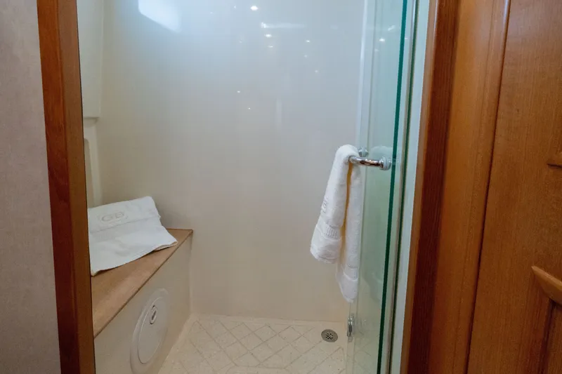 Slide: The Image of Shower area in 2010 Grand Banks 41 Heritage EU yacht with glass door and towel. - 24