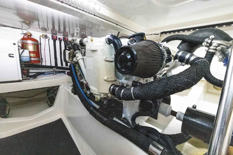 Slide: The Image of Engine room of 2010 Grand Banks 41 Heritage EU yacht, showcasing detailed mechanical components. - 38