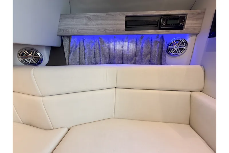 Slide: The Image of Interior of 2020 Formula 330 Crossover Bowrider I/O with plush seating and audio system. - 17