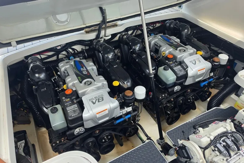 Slide: The Image of 2020 Formula 330 Crossover Bowrider I/O engine compartment with dual V8 engines. - 22