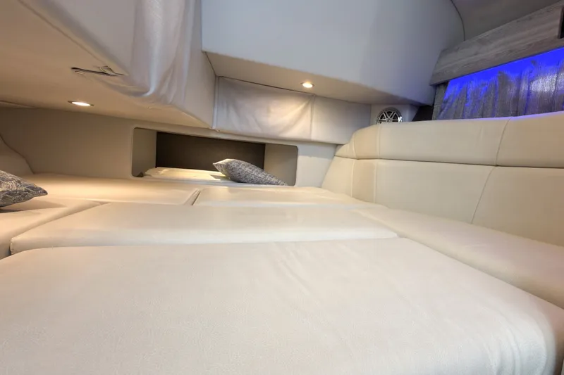 Slide: The Image of Interior cabin of 2020 Formula 330 Crossover Bowrider I/O with plush seating and ambient lighting. - 18