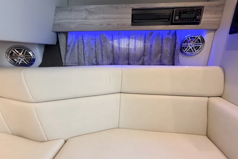 Slide: The Image of Interior of 2020 Formula 330 Crossover Bowrider I/O with plush seating and modern audio system. - 19