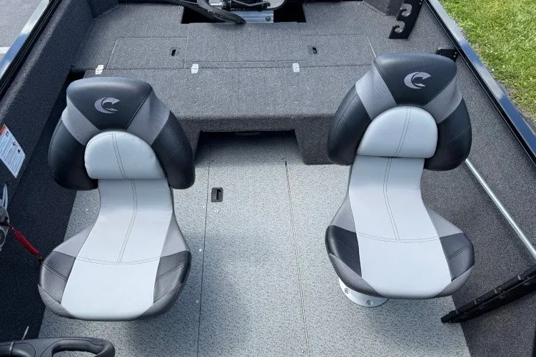 Slide: The Image of 2026 Crestliner 1650 Kodiak WT boat interior with two cushioned seats. - 10