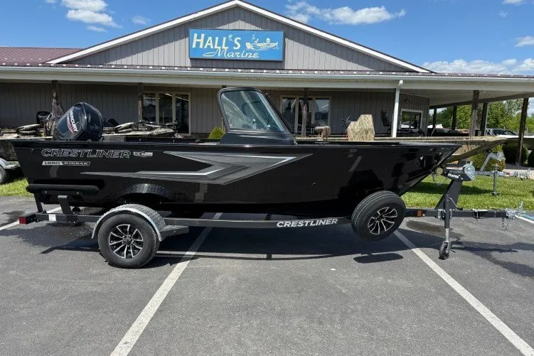Slide: The Image of 2026 Crestliner 1650 Kodiak WT boat on trailer at Hall's Marine dealership. - 1