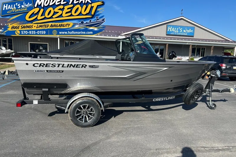 The Image of 2026 Crestliner 1650 Kodiak WT boat on trailer at Hall's Marine dealership. - 0