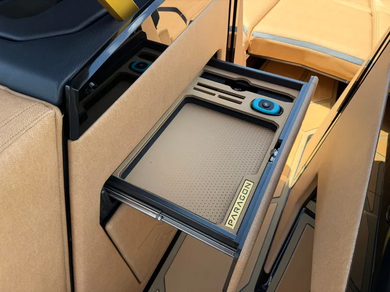 Slide: The Image of A sleek, modern interior with a pull-out compartment labeled "Paragon." - 26
