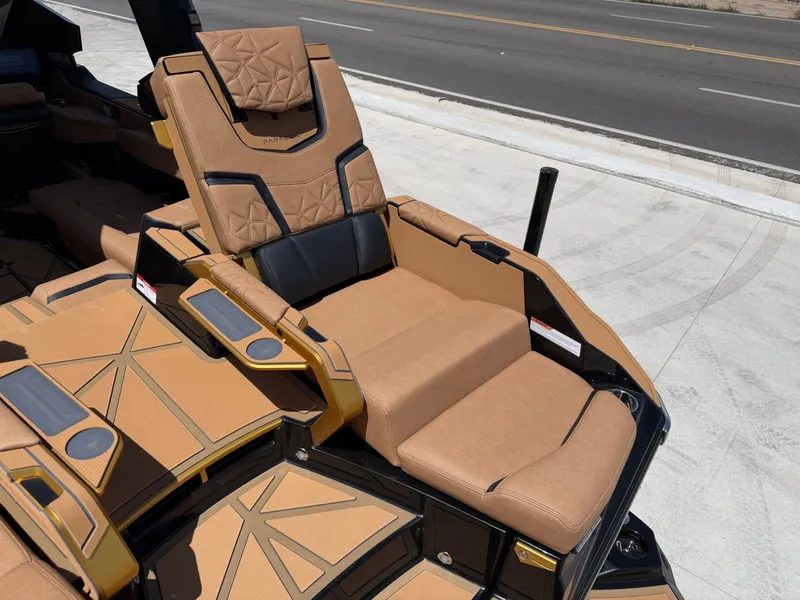 Slide: The Image of Luxurious reclining seat on a 2027 Nautique Super Air Nautique G23 Paragon, featuring elegant upholstery. - 15