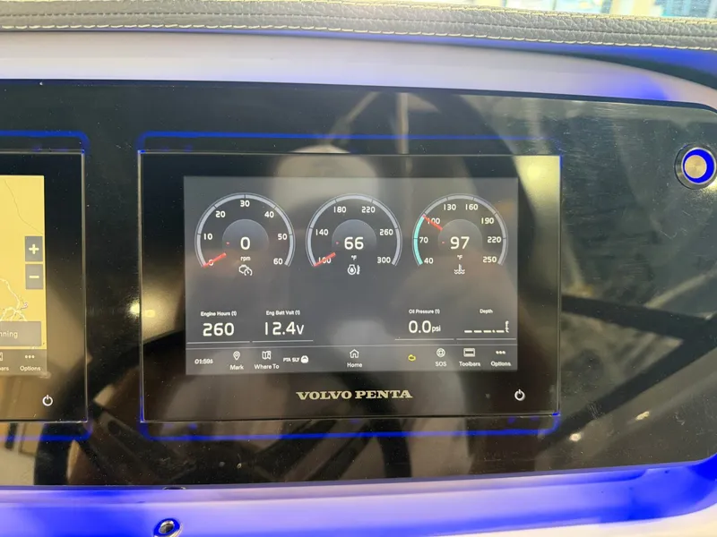 Slide: The Image of The image shows a Volvo Penta dashboard with various gauges and readings. - 26
