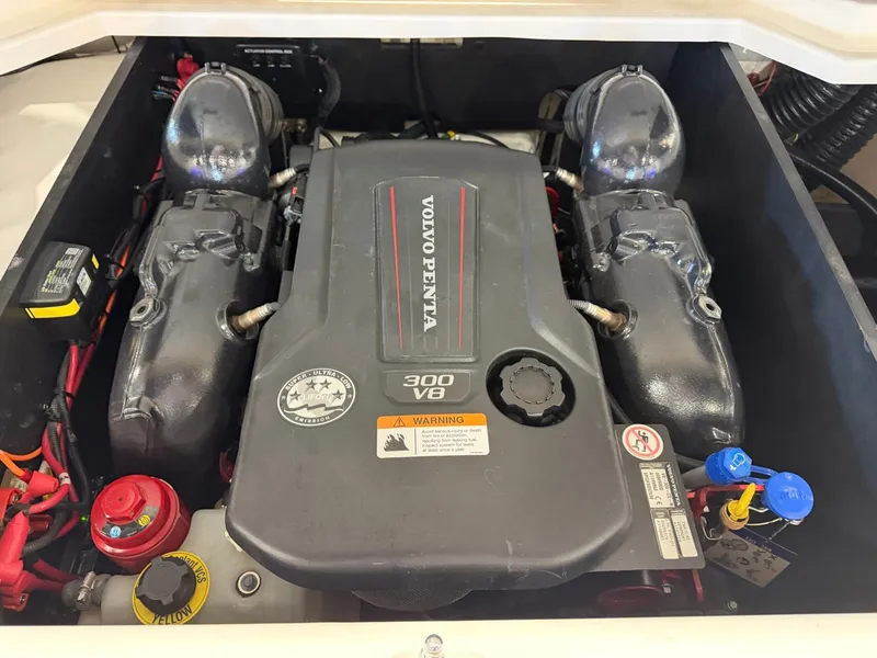 Slide: The Image of The engine compartment of a 2022 Regal LS2 Surf with a Volvo Penta 300 V8 engine. - 31
