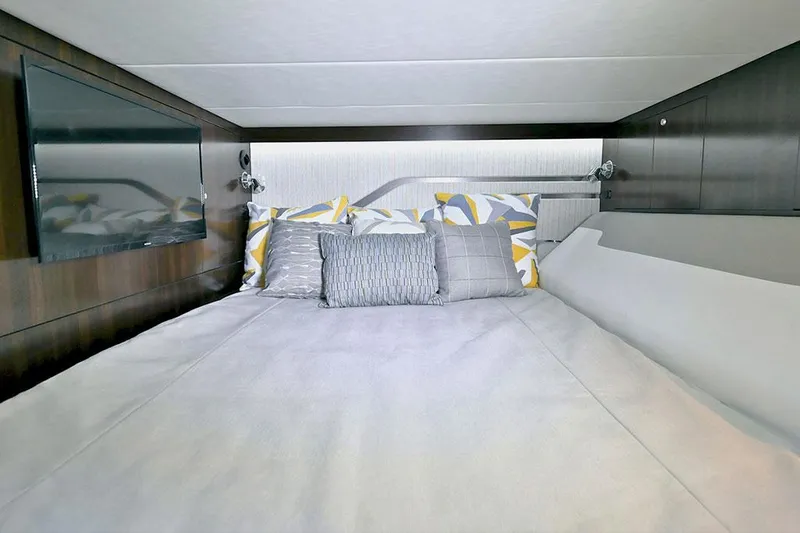 Slide: The Image of Manufacturer Provided Image: Luxurious cabin interior of 2021 Cruisers Yachts 42 GLS with modern bedding. - 18