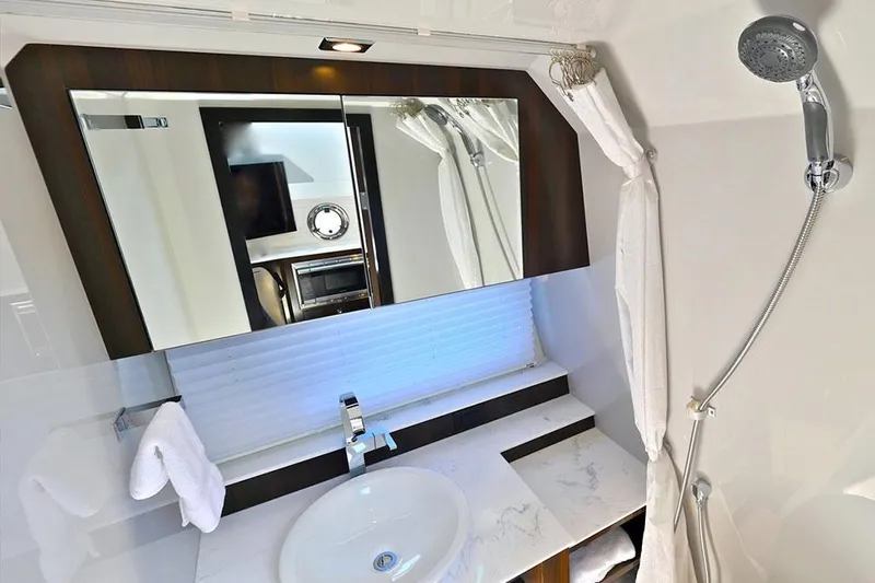 Slide: The Image of Manufacturer Provided Image: Luxurious bathroom in 2021 Cruisers Yachts 42 GLS with modern fixtures and elegant design. - 17