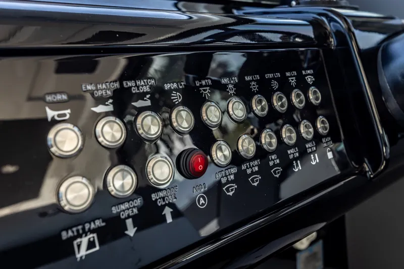 Slide: The Image of Control panel of 2021 Cruisers Yachts 42 GLS OB with various buttons and indicators. - 13