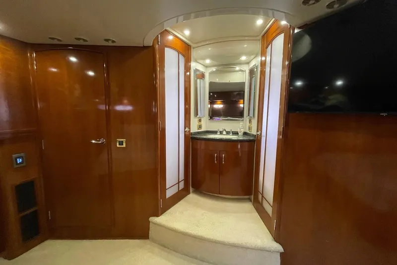 Slide: The Image of Luxurious interior of 2004 Carver 570 Voyager Pilothouse with elegant wood finishes. - 16