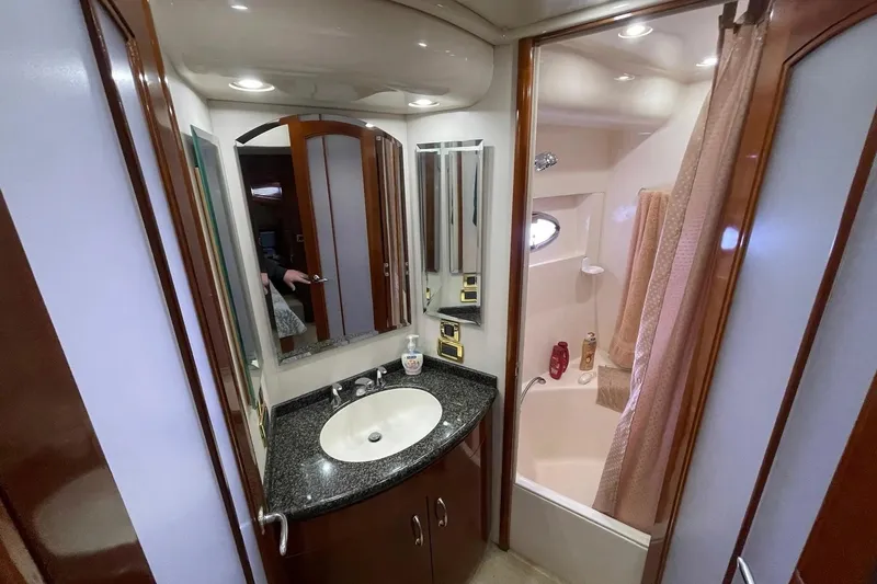 Slide: The Image of Luxurious bathroom in 2004 Carver 570 Voyager Pilothouse yacht with modern fixtures. - 18