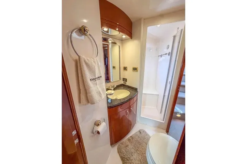 Slide: The Image of Luxurious bathroom in 2004 Carver 570 Voyager Pilothouse yacht with modern amenities. - 20