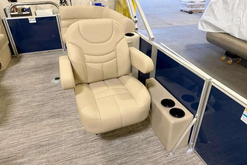 Slide: The Image of Beige captain's chair on a 2027 Godfrey EX 2086 SBX pontoon boat, featuring cup holders. - 8
