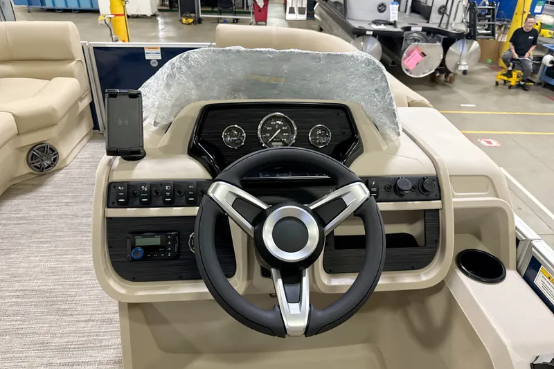 Slide: The Image of Steering console of 2027 Godfrey EX 2086 SBX boat with modern controls and gauges. - 5