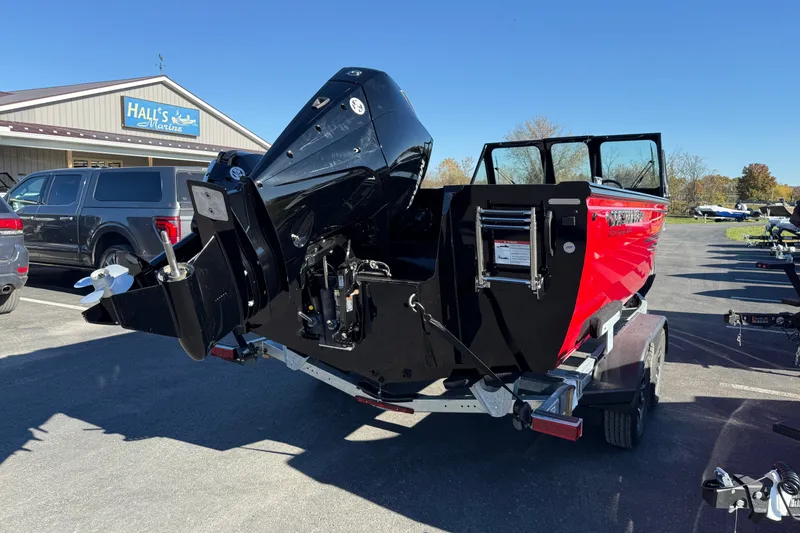 Slide: The Image of 2026 Crestliner 2050 Commander Elite boat with powerful outboard motor, parked at Hall's Marine. - 20