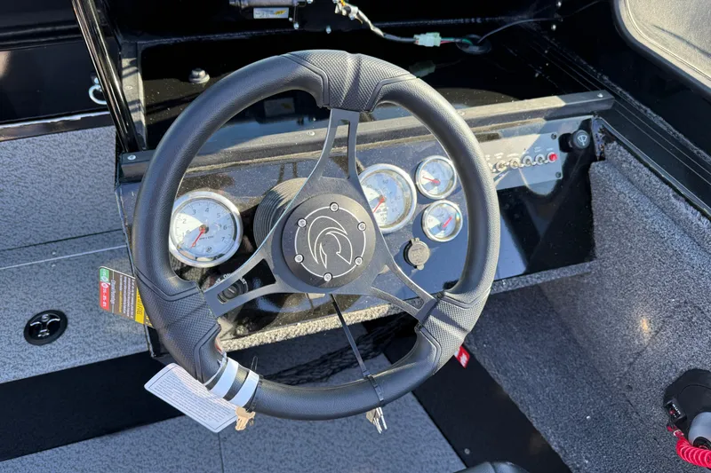 Slide: The Image of Steering wheel and dashboard of 2026 Crestliner 2050 Commander Elite boat. - 9