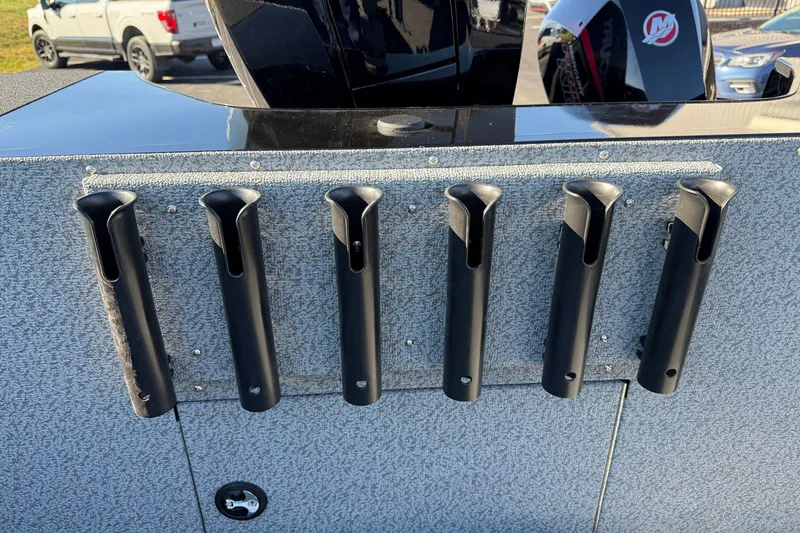 Slide: The Image of Rod holders on a 2026 Crestliner 2050 Commander Elite boat, featuring a sleek design. - 14