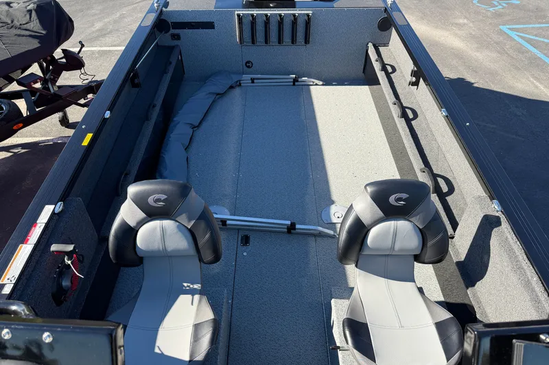 Slide: The Image of 2026 Crestliner 2050 Commander Elite boat interior with two seats and spacious deck. - 10