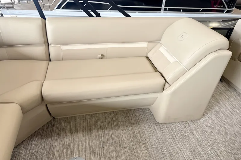 Slide: The Image of Luxurious beige seating on 2027 Godfrey EX 1880 CX boat, featuring plush upholstery. - 11