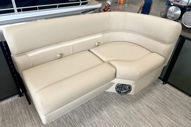 Slide: The Image of Luxurious beige seating on 2027 Godfrey EX 1880 CX boat, featuring integrated speaker. - 4
