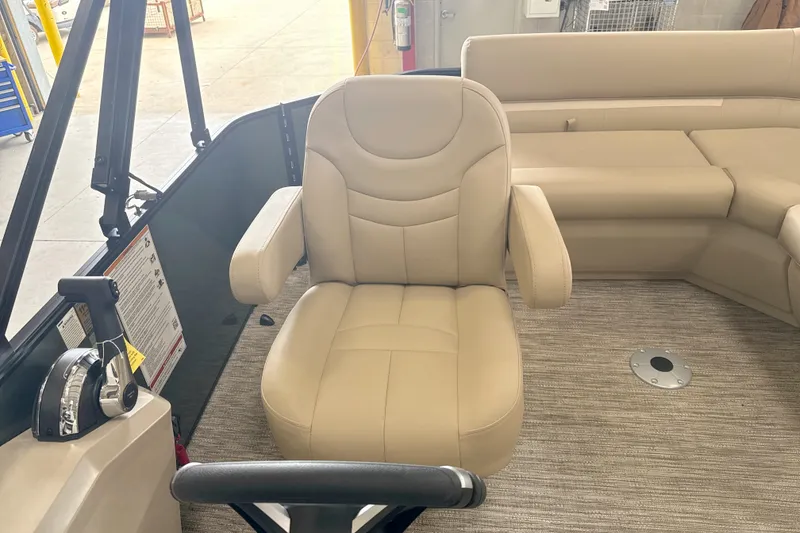 Slide: The Image of Beige captain's chair in 2027 Godfrey EX 1880 CX boat interior. - 10