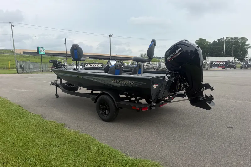 Slide: The Image of 2027 Ranger RT178 boat with Mercury engine on a trailer in a parking lot. - 5