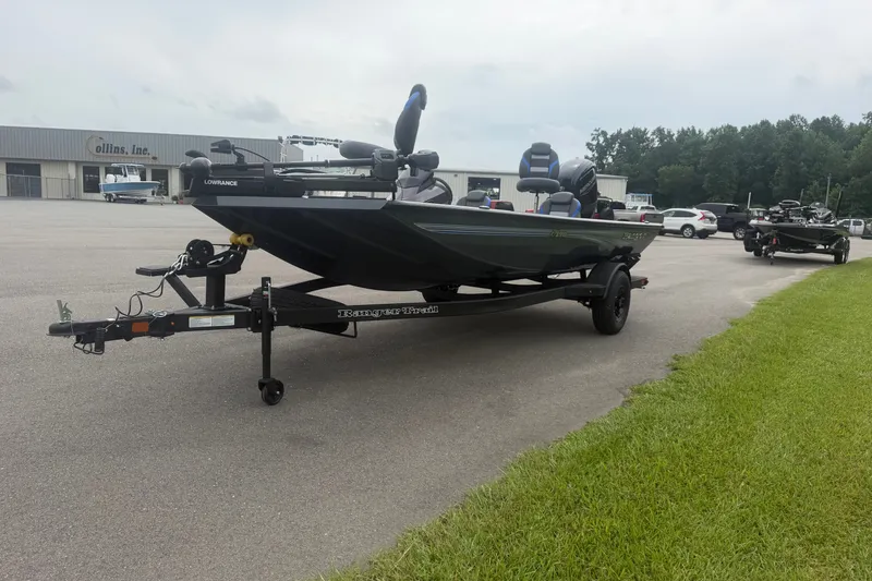 Slide: The Image of 2027 Ranger RT178 boat on trailer in parking lot, featuring Lowrance equipment. - 3