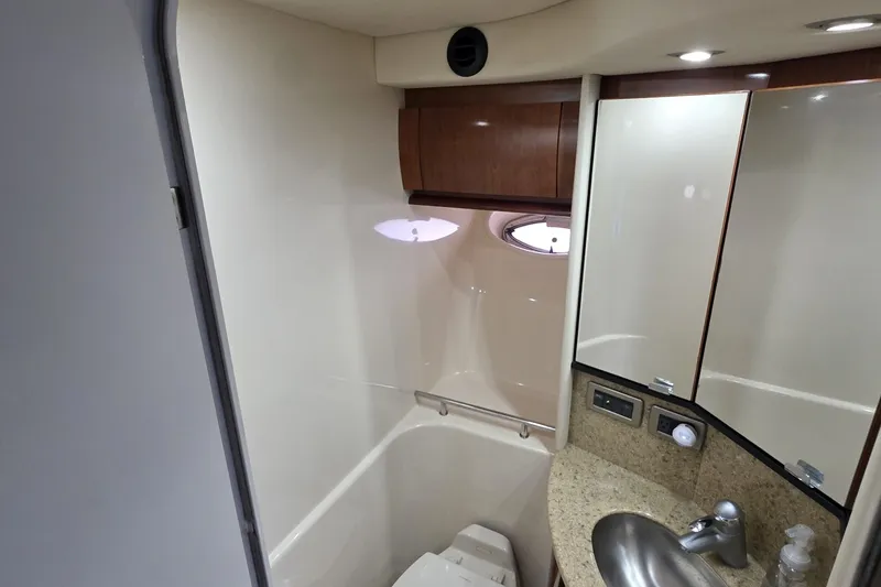 Slide: The Image of Luxurious bathroom interior of 2004 Sea Ray 420 Sundancer yacht with modern fixtures. - 41
