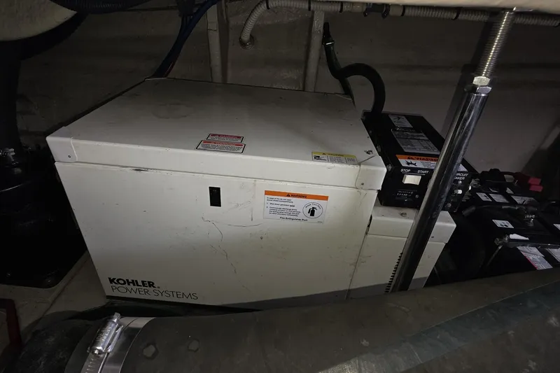 Slide: The Image of Kohler power system in 2004 Sea Ray 420 Sundancer engine room. - 47