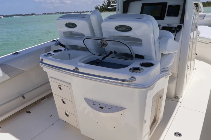 Slide: The Image of 2009 Boston Whaler 280 Outrage boat interior with seating and control panel. - 6