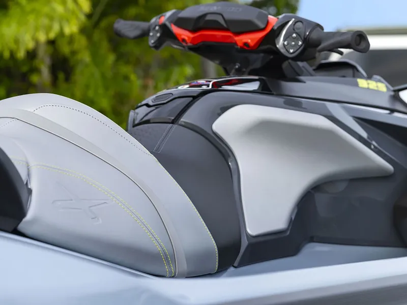 Slide: The Image of Close-up of a modern Sea-Doo jet ski with ergonomic seating and stylish handlebars. - 37
