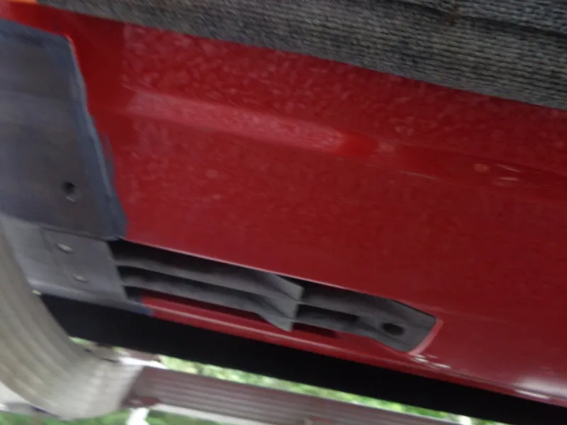 Slide: The Image of Close-up of a red 2024 Sea-Doo RXT-X 325 with gray details. - 26