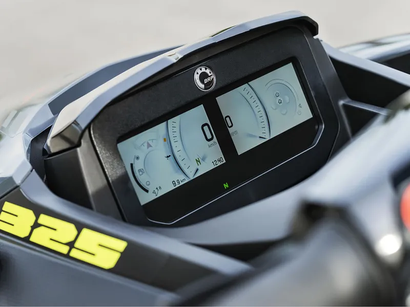 Slide: The Image of The image shows the dashboard of a Sea-Doo RXT-X 325 with a digital display and speedometer. - 36