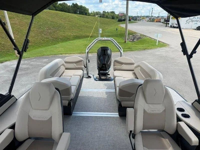 Slide: The Image of The image shows the interior of a 2027 Flamingo ROVE 245 boat with beige seating. - 36