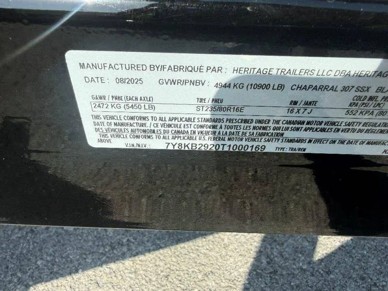 Slide: The Image of A label on a trailer displays technical specifications and manufacturing details. - 49
