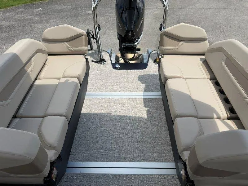 Slide: The Image of The image shows the interior of a 2027 Flamingo ROVE 245 boat with beige seating. - 46