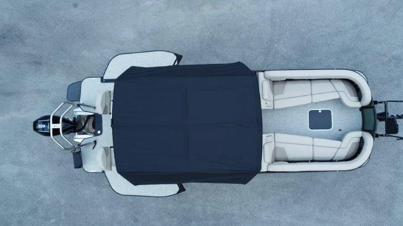 Slide: The Image of Aerial view of a 2027 Flamingo ROVE 245 with a black cover and beige seating. - 12