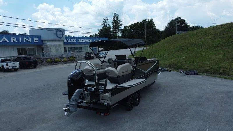 Slide: The Image of The image shows a 2027 Flamingo ROVE 245 boat on a trailer in front of a sales building. - 9