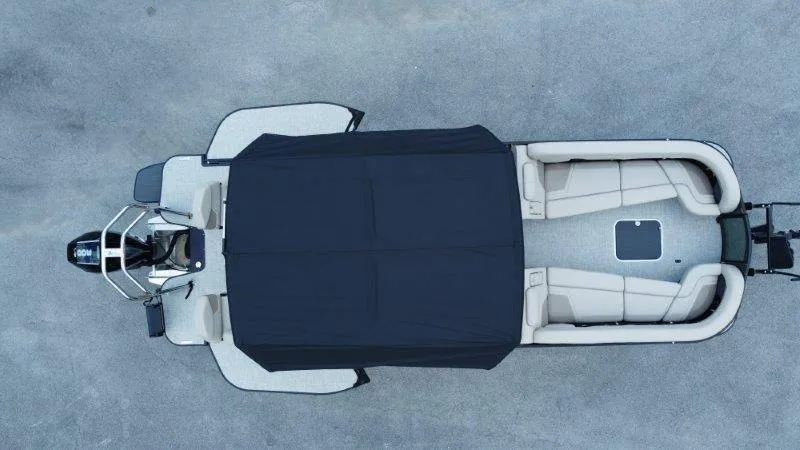 Slide: The Image of Aerial view of a 2027 Flamingo ROVE 245 with a black cover and beige seating. - 4