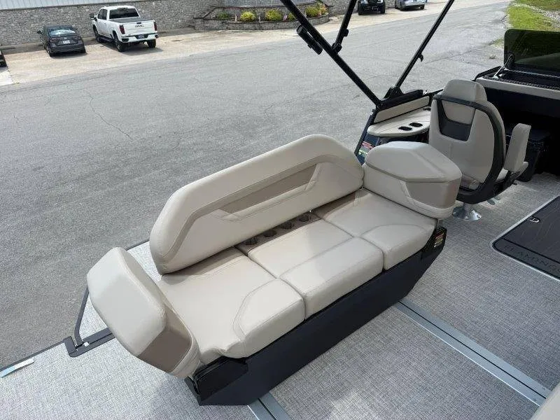 Slide: The Image of The image shows a modern boat seat with light gray upholstery and adjustable headrests. - 45