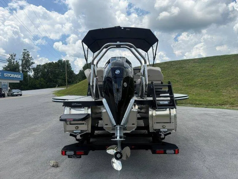 Slide: The Image of The image shows a 2027 Flamingo ROVE 245 boat with a black outboard motor and a sunshade. - 26