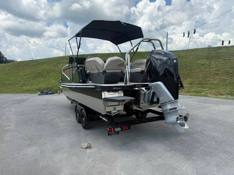 Slide: The Image of The image shows a 2027 Flamingo ROVE 245 boat on a trailer. - 22