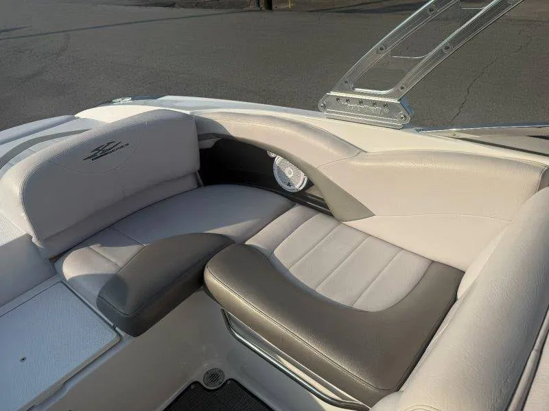 Slide: The Image of The 2006 MasterCraft X-80 features a sleek, cushioned seating area with gray and white accents. - 45