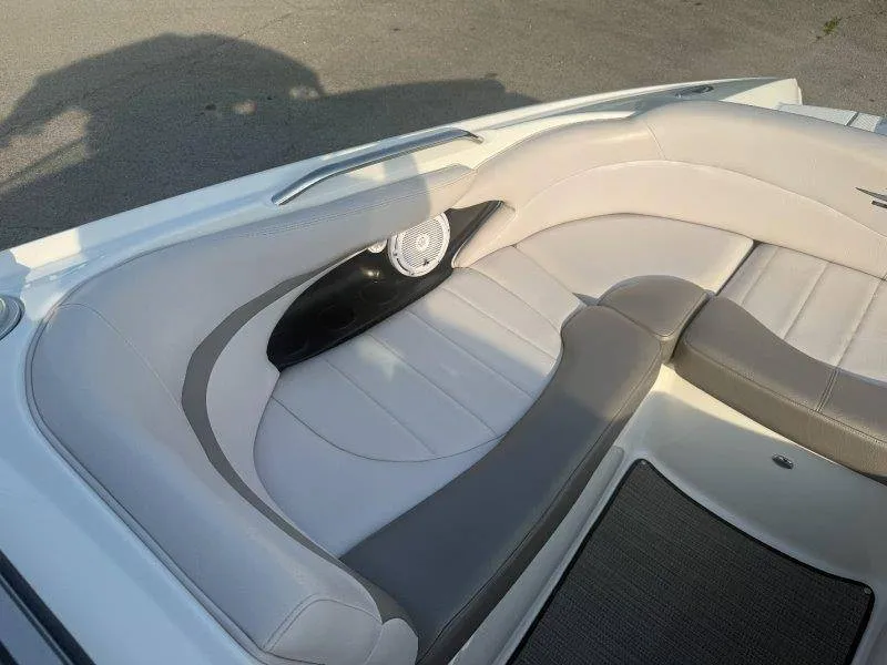 Slide: The Image of The image shows the white and gray upholstery of a 2006 MasterCraft X-80. - 29