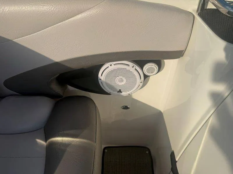 Slide: The Image of Close-up of a speaker in a boat with gray upholstery. - 43