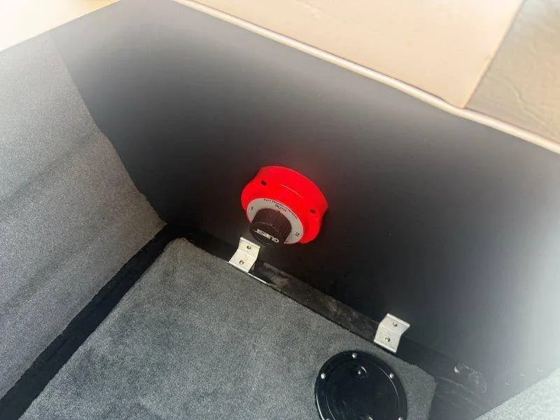 Slide: The Image of The interior of a boat features a red speaker set into a padded wall. - 26