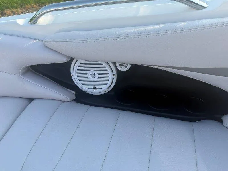 Slide: The Image of Close-up of a white boat seat with speaker and cup holders. - 36